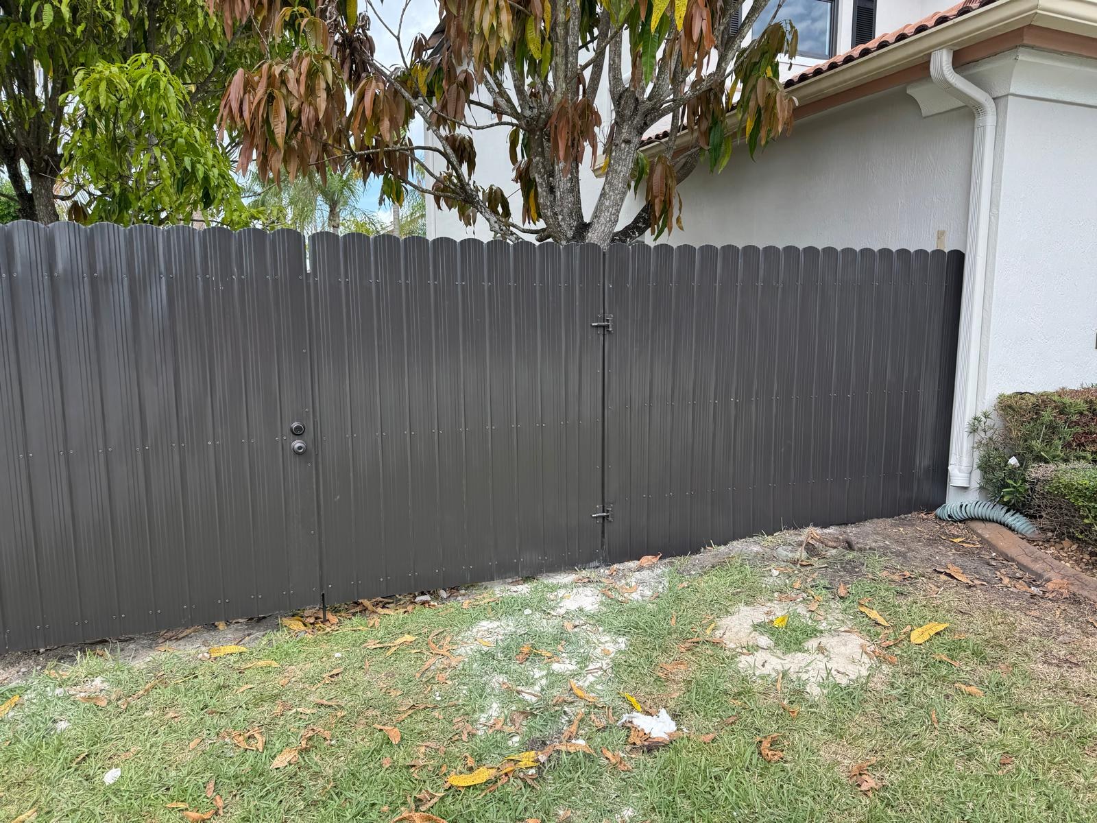 Finished fence along a residential yard